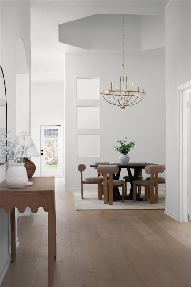 Eye-catching chandelier adds a modern touch. | Image 4