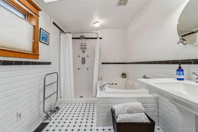 The primary bedroom has its own bathroom | Image 27