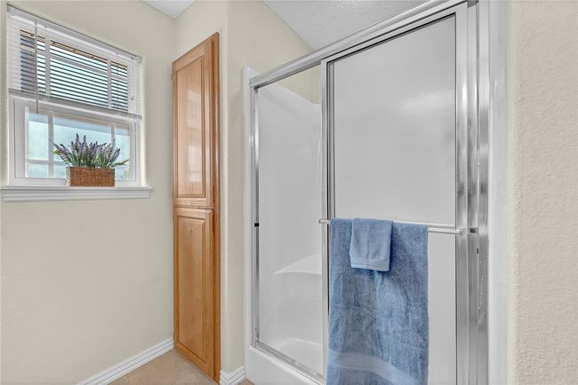 Master bathroom shower and more storage. | Image 13