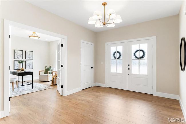 Large entry foyer and home office with designer lighting! | Image 8