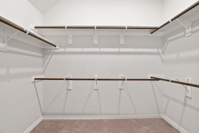 Walk in closet with carpet | Image 18