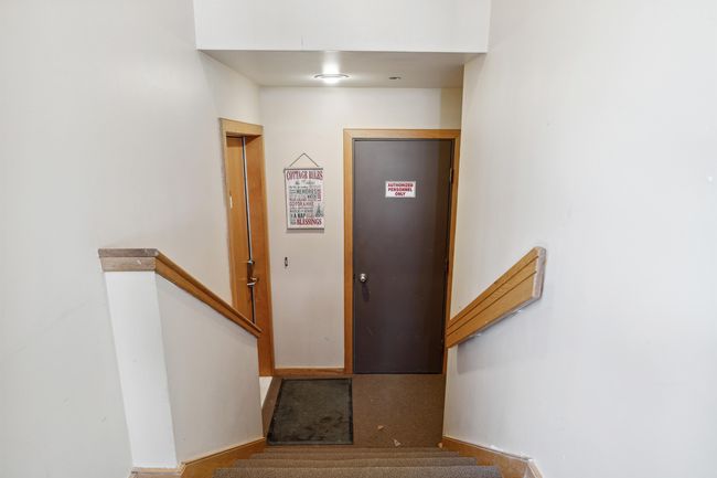 Step down and door is to the left, ski locker is to the right. This entrance is not shared, allowing additional privacy. | Image 20