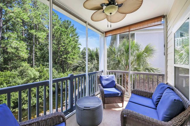 Sunroom / solarium with ceiling fan and healthy amount of natural light | Image 21