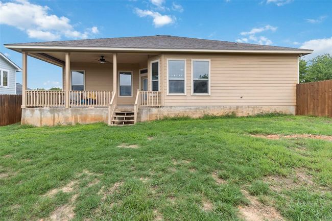 Back of property featuring a ceiling fan | Image 30