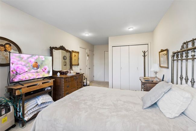 Bedroom featuring a closet and carpet | Image 23