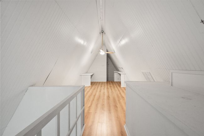 Bonus room with laminate flooring and lofted ceiling | Image 31