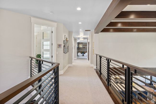 Hallway with baseboards, plenty of natural light, an upstairs landing, carpet, and recessed lighting | Image 54