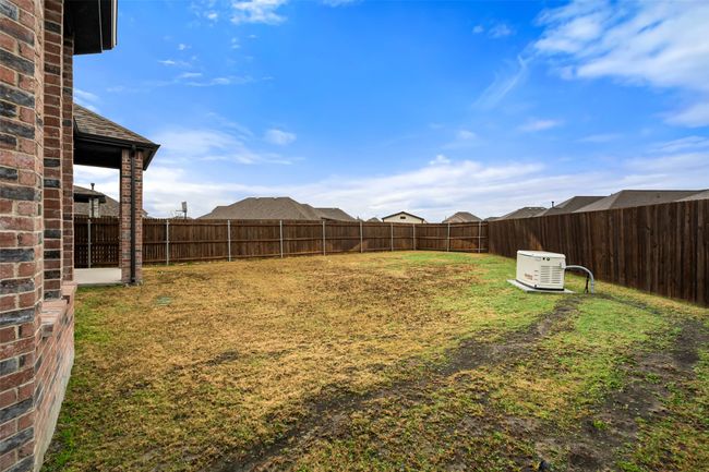 Backyard with plenty of room for a pool and entertaining area. Cemented poles and great fencing | Image 21