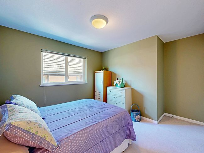 Bedroom featuring carpet and baseboards | Image 29