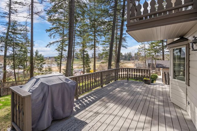 Wooden deck featuring grilling area | Image 10