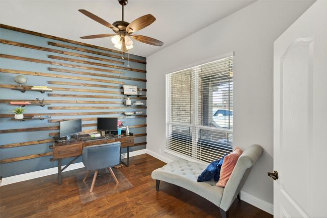 Office with ceiling fan and wood finished floors | Image 7