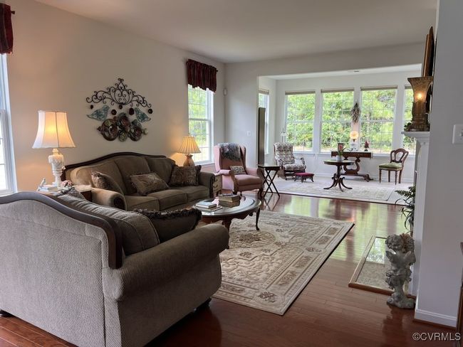 Living room featuring dark wood-type flooring | Image 24