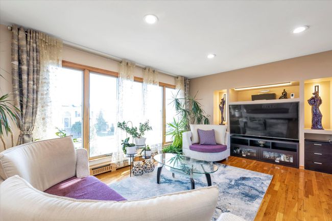 Living area featuring recessed lighting and wood finished floors | Image 7
