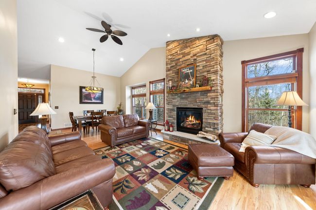 Open concept space highlighted by the oversized windows for an abundance of natural light. | Image 8