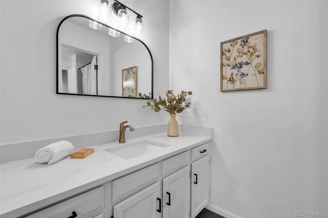 Primary bedroom vanity with new quartz countertop | Image 21