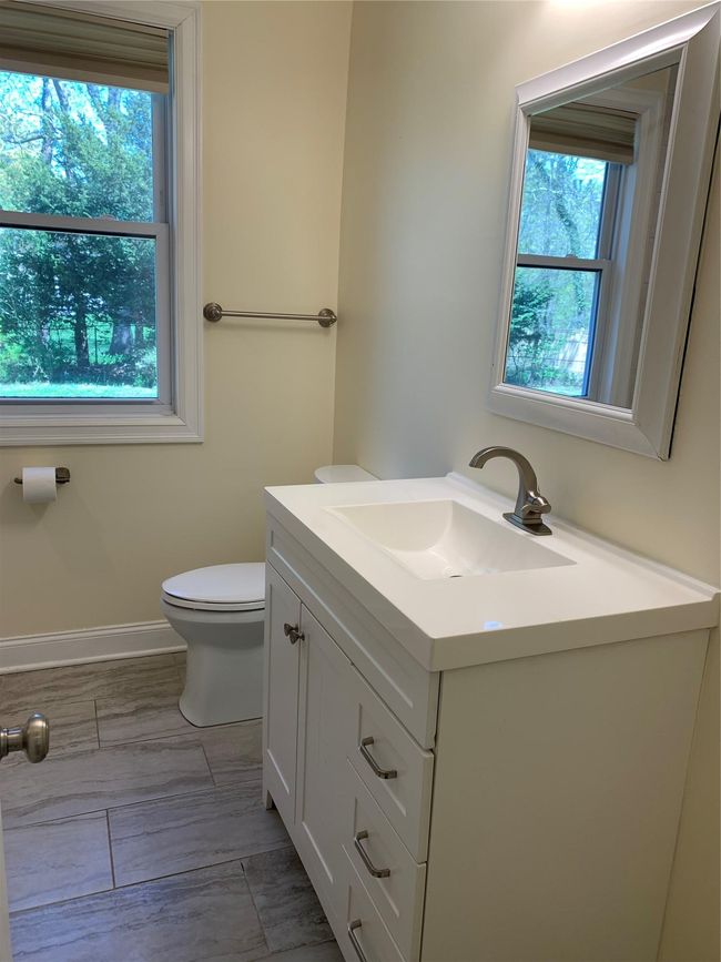 Full bath on first floor with a tub. | Image 5