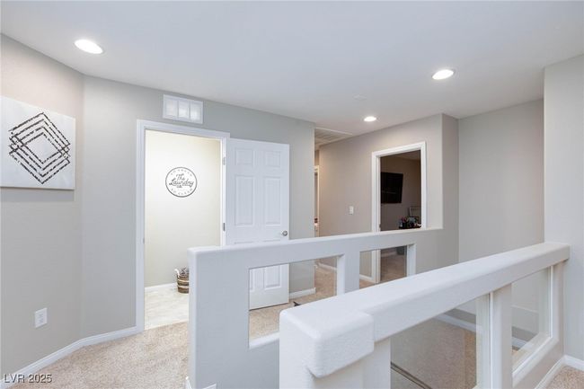 Hall featuring baseboards, visible vents, carpet floors, and recessed lighting | Image 19
