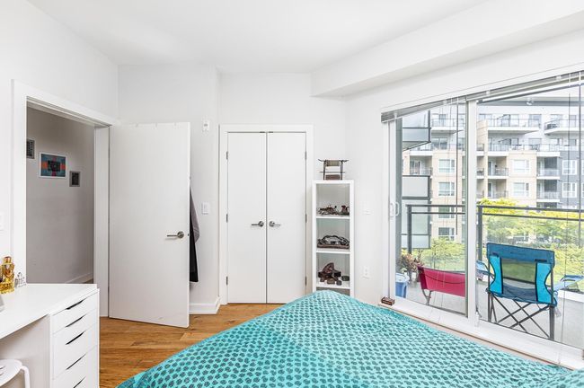 Bedroom with access to outside, light wood-style flooring, and a closet | Image 9