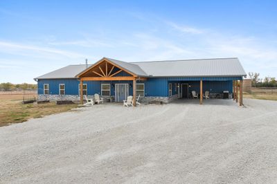 View of front of home with a carport | Image 2