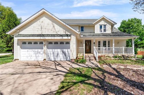 715 Lark St, Raymore, MO, 64083-9266 | Card Image