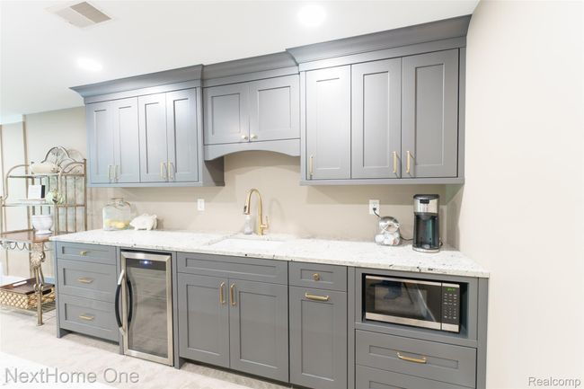 Wet Bar with plenty of storage | Image 21