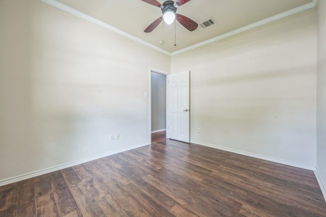 Three additional bedrooms offer flexibility for family, guests, or home office needs—the fourth bedroom is ideal as a study or workspace. | Image 20