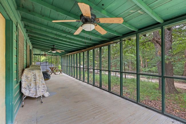 Sunroom / solarium with ceiling fan and beam ceiling | Image 18