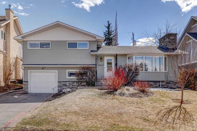 2603 34 Avenue Nw, Home with 4 bedrooms, 2 bathrooms and 3 parking in Calgary AB | Image 1