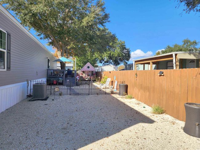 View of yard with central AC unit | Image 23
