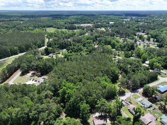 Birds eye view of property with a wooded view | Image 8