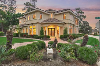 Welcome to your dream home! This luxurious 5 bedroom, 5 1/2 bath home is located at 64 West Shore Ln. | Image 1