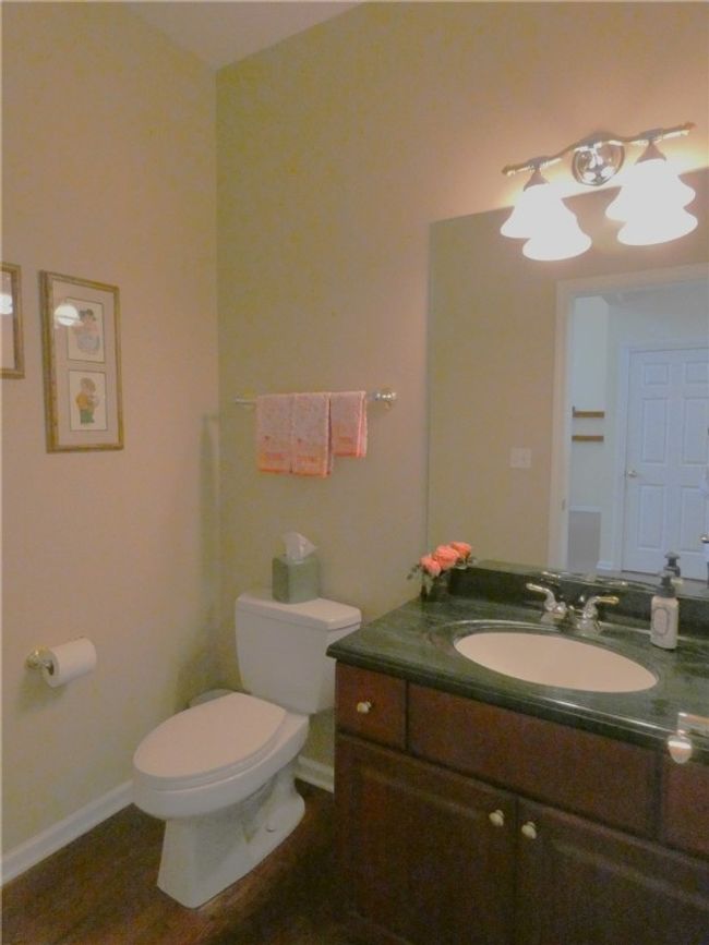 The main level is the location to the half bath | Image 24