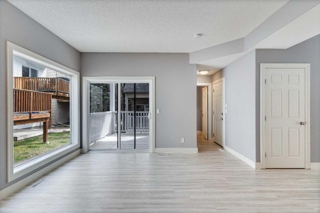 135 Bridlewood View Sw, Home with 4 bedrooms, 2 bathrooms and 3 parking in Calgary AB | Image 9