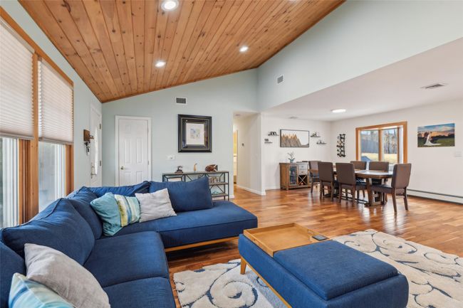 Living area with recessed lighting, visible vents, wooden ceiling, and vaulted ceiling | Image 8