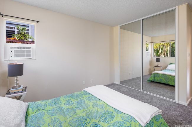 Bedroom #1 with new carpet, paint, window AC and mirrored closet doors. This room is ready for your touches! | Image 14