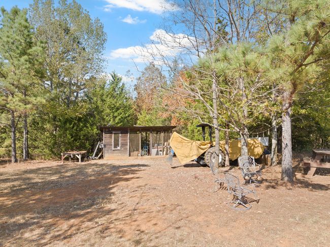 View of yard with an outdoor structure | Image 28