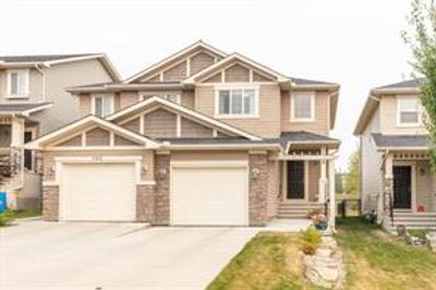 542 Panatella Sq Nw, Home with 3 bedrooms, 2 bathrooms and 2 parking in Calgary AB | Image 1