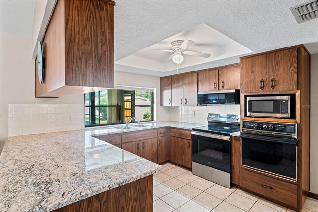2013 Meredith Dr, House other with 3 bedrooms, 3 bathrooms and null parking in SPRING HILL FL | Image 6