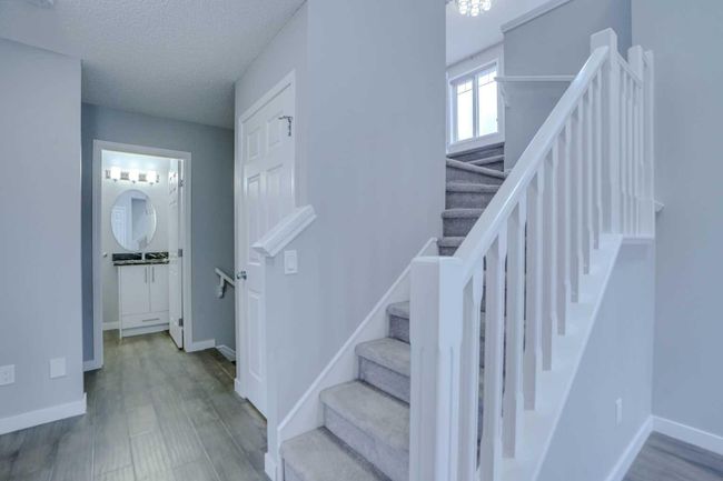 98 Evansbrooke Park Nw, Home with 4 bedrooms, 3 bathrooms and 4 parking in Calgary AB | Image 6
