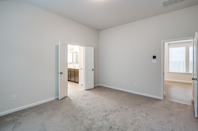 View of carpeted spare room | Image 16