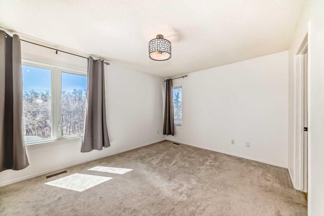 207 Coachway Rd Sw, House other with 3 bedrooms, 3 bathrooms and 2 parking in Calgary AB | Image 23