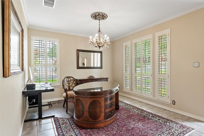Flexible space that can be used for a home office, formal living or stylish lounge area. | Image 9