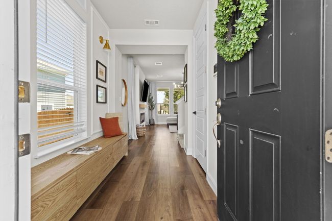 Entryway with wood finished floors and baseboards | Image 10