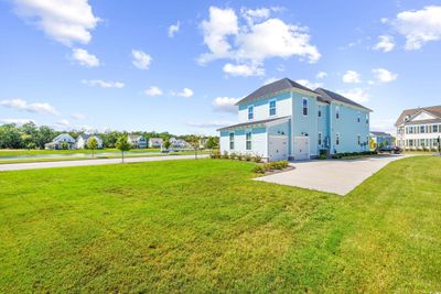 Back of house featuring a lawn | Image 3