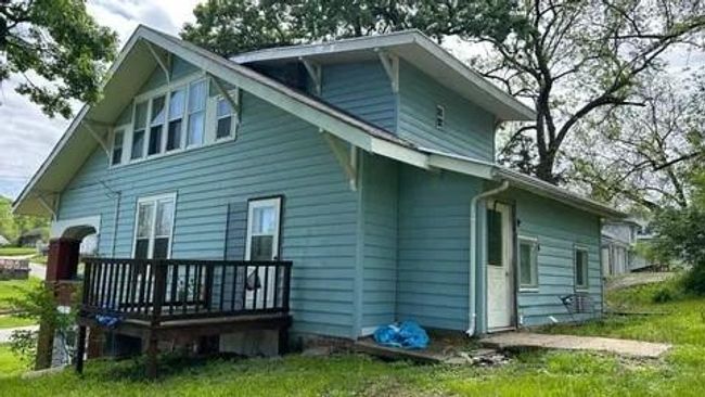 Back of property featuring a wooden deck | Image 4