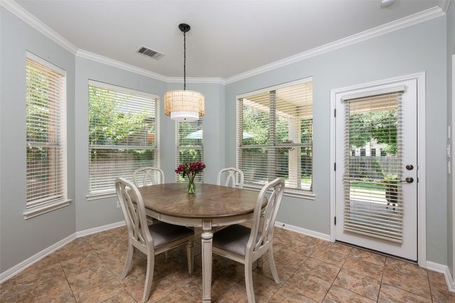 The bay window adds space to the breakfast area. | Image 10