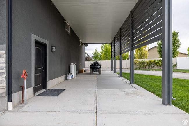 View of patio / terrace with a carport | Image 89