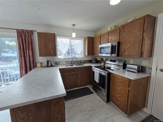 7071 Mc Dougal Pl, House other with 4 bedrooms, 3 bathrooms and 2 parking in Port Hardy BC | Image 11