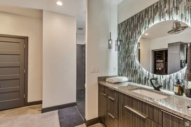 Full bathroom featuring recessed lighting, walk in shower, vanity, and baseboards | Image 22