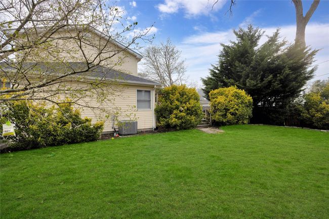 View of yard featuring central AC unit | Image 27